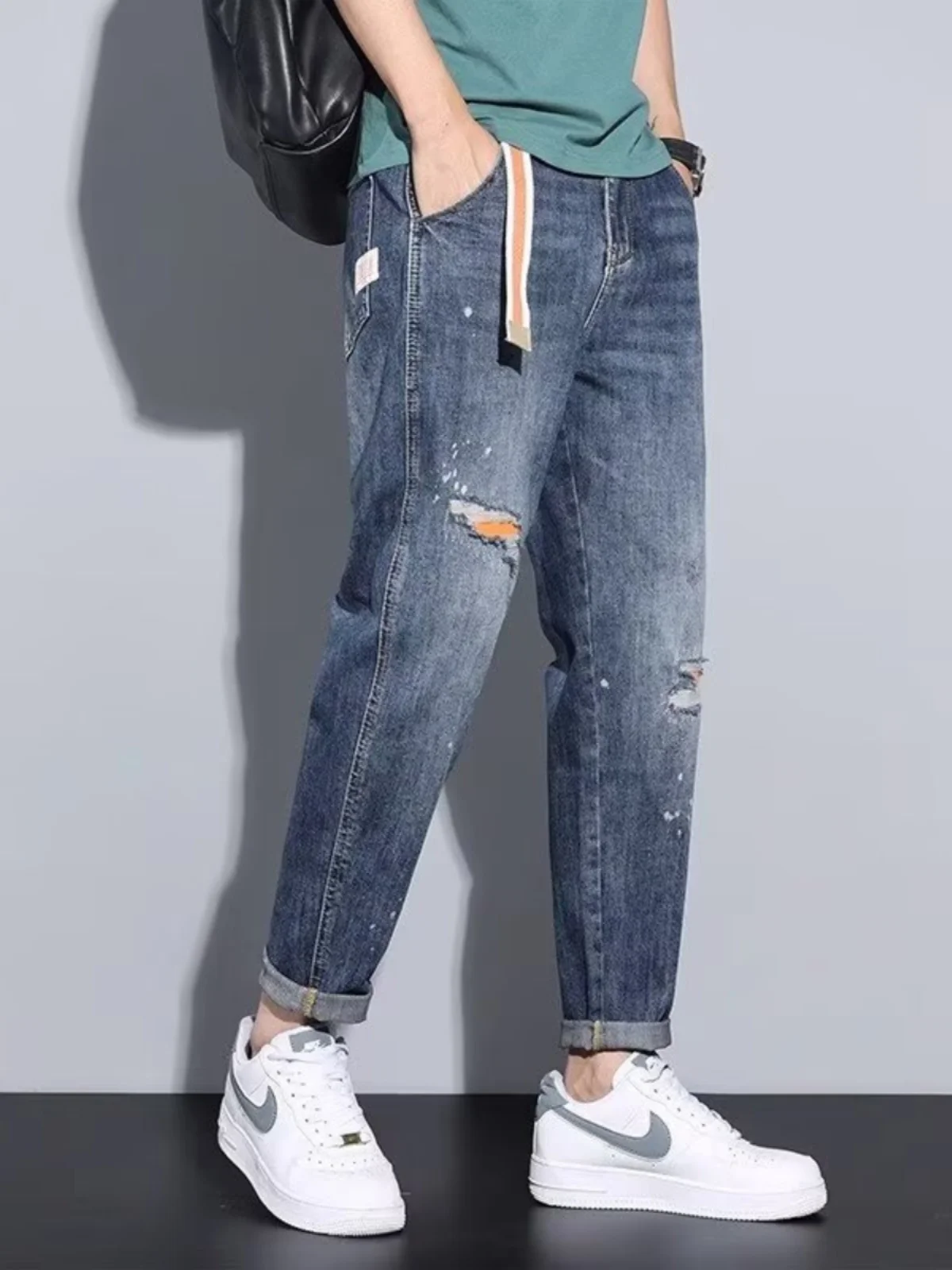 Мужские джинсовые джинсы свободного покроя с брызгами чернил, облегающие повседневные длинные брюки, весенне-осенняя одежда, молодежная мода
Мужские джинсовые джинсы свободного покроя с брызгами чернил, облегающие повседневные длинные брюки, весенне-осенняя одежда, молодежная мода