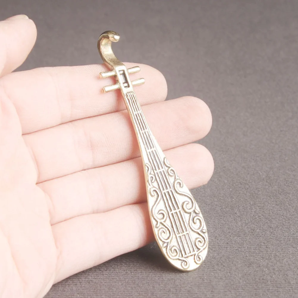 Brass Pipa Ornament Small Retro Style Desktop Chinese Lute Decorative Miniature Pipa Sculpture for Office Home Decor
Brass Pipa Ornament Small Retro Style Desktop Chinese Lute Decorative Miniature Pipa Sculpture for Office Home Decor