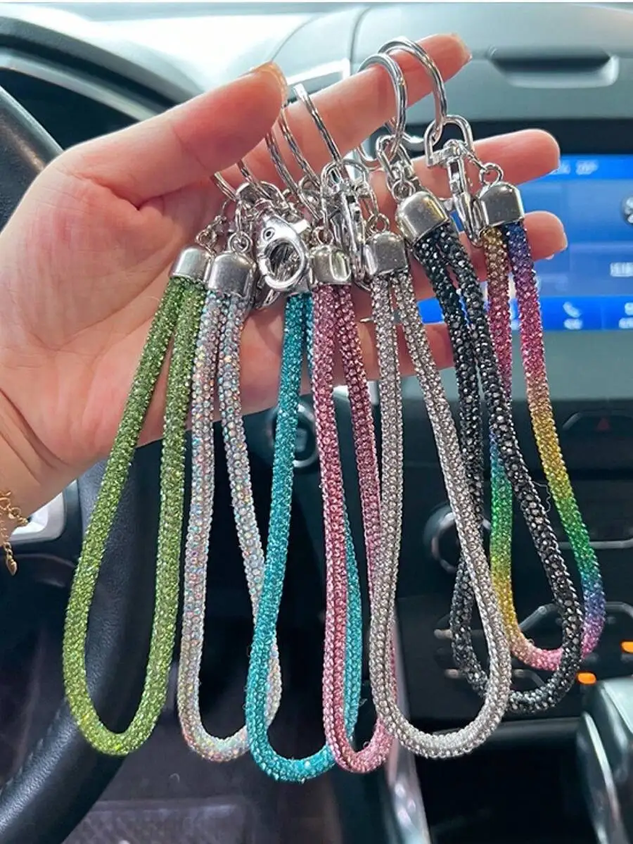 Fashionable Rhinestone Phone Strap With Keychain For Women, Bling Key Bag Hanging Decor With Wrist Strap Gift Souvenir Car Acces
Fashionable Rhinestone Phone Strap With Keychain For Women, Bling Key Bag Hanging Decor With Wrist Strap Gift Souvenir Car Acces