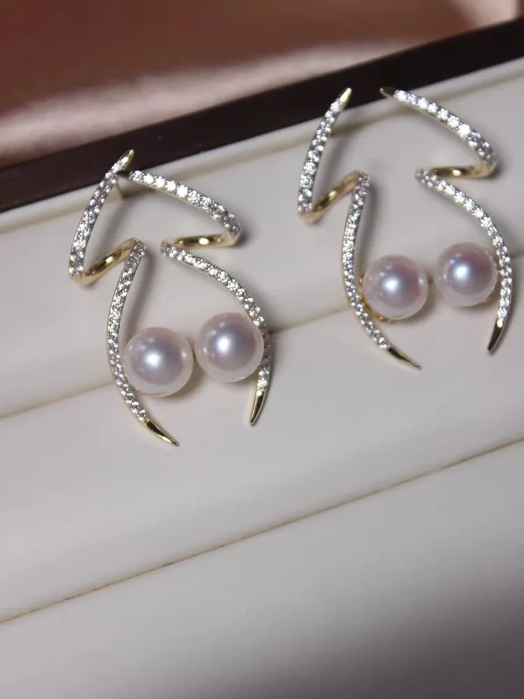 Fashionable and elegant AAAA 9-10 natural South Sea round pearl silver curved diamond studded earrings 925s customized version
Fashionable and elegant AAAA 9-10 natural South Sea round pearl silver curved diamond studded earrings 925s customized version