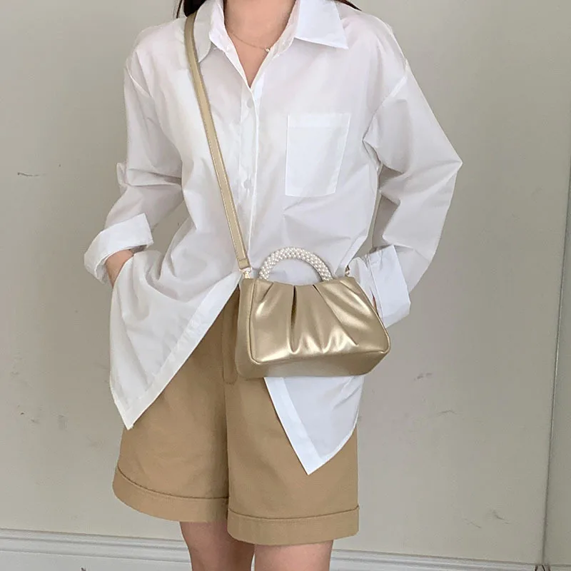 PU Pleated Cloud Bag Carrying Solid Color Pearl Handle Handbag Korean Style Portable Women Crossbody Bag Female Lady Girl
PU Pleated Cloud Bag Carrying Solid Color Pearl Handle Handbag Korean Style Portable Women Crossbody Bag Female Lady Girl