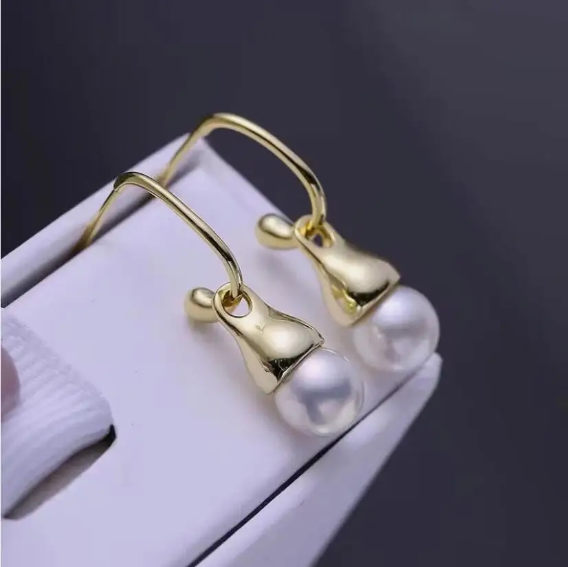 Новые серьги-подвески с натуральным черным таитянским жемчугом AAA+ идеальной круглой формы 9-10 мм, серебро 925 пробы
Новые серьги-подвески с натуральным черным таитянским жемчугом AAA+ идеальной круглой формы 9-10 мм, серебро 925 пробы