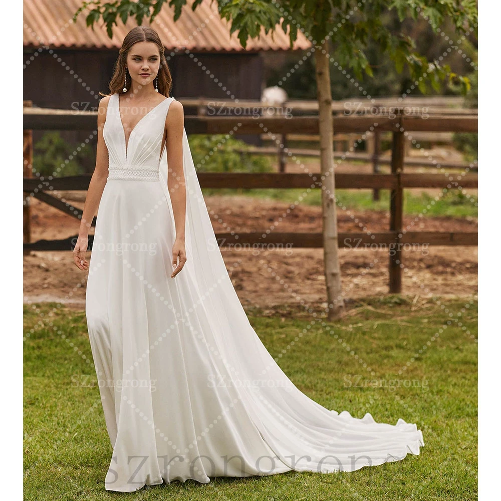 Custom Made vestido de Deep V-neck Chiffon Modern Wedding Dress Lace A-line Open Back Floor Length Bridal Dress Chapel Court
Custom Made vestido de Deep V-neck Chiffon Modern Wedding Dress Lace A-line Open Back Floor Length Bridal Dress Chapel Court