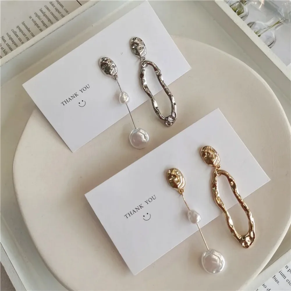 New Elegant Asymmetric Earring Imitation Pearl Metallic Exaggerated Long Stud Earring Ladies and Girls Party Jewelry Gifts
New Elegant Asymmetric Earring Imitation Pearl Metallic Exaggerated Long Stud Earring Ladies and Girls Party Jewelry Gifts