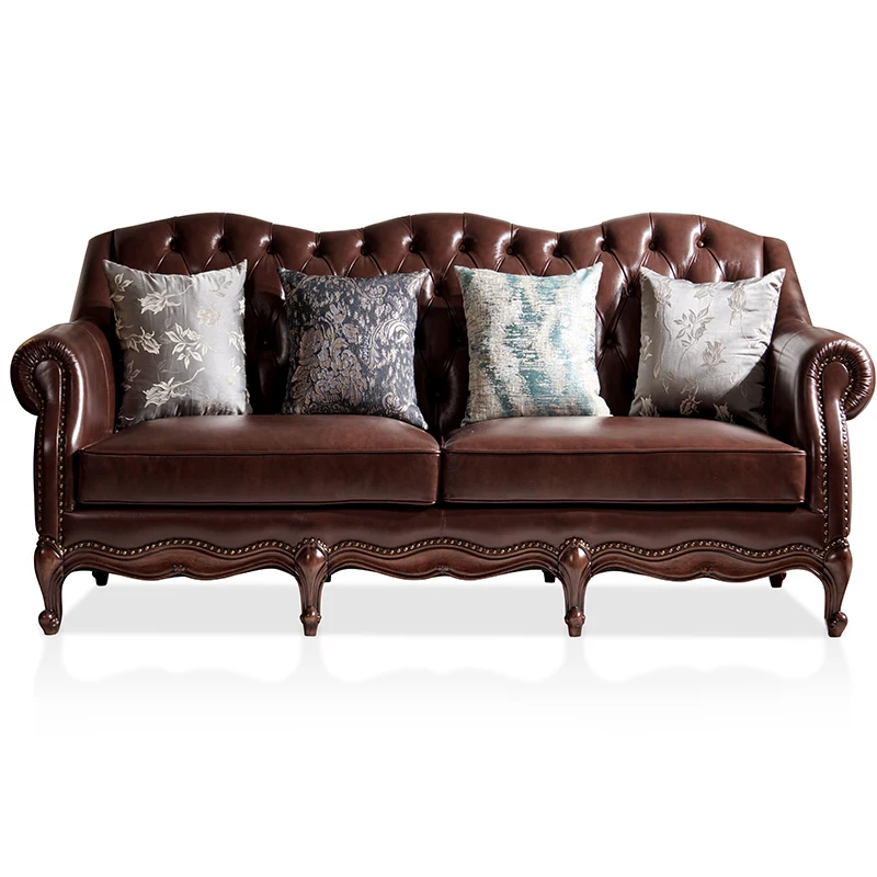 Vintage tufted leather sofa with rolling arms and carved wooden legs for living room, villa or classic lounge interiors
Vintage tufted leather sofa with rolling arms and carved wooden legs for living room, villa or classic lounge interiors