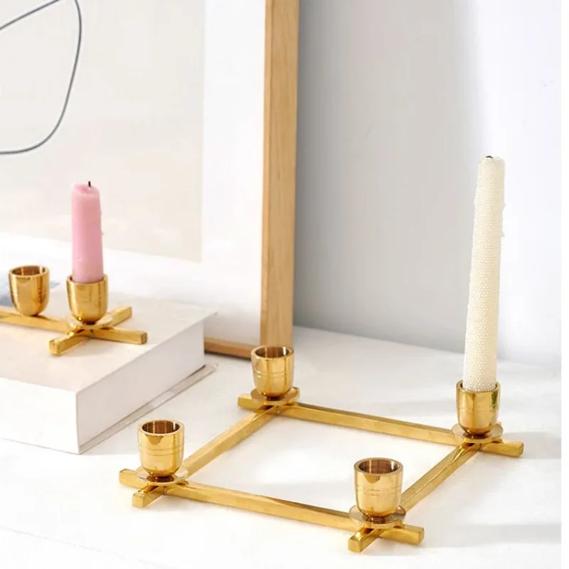 Modern simple light luxury gold four-headed candlestick ornament, villa restaurant atmosphere decoration
Modern simple light luxury gold four-headed candlestick ornament, villa restaurant atmosphere decoration