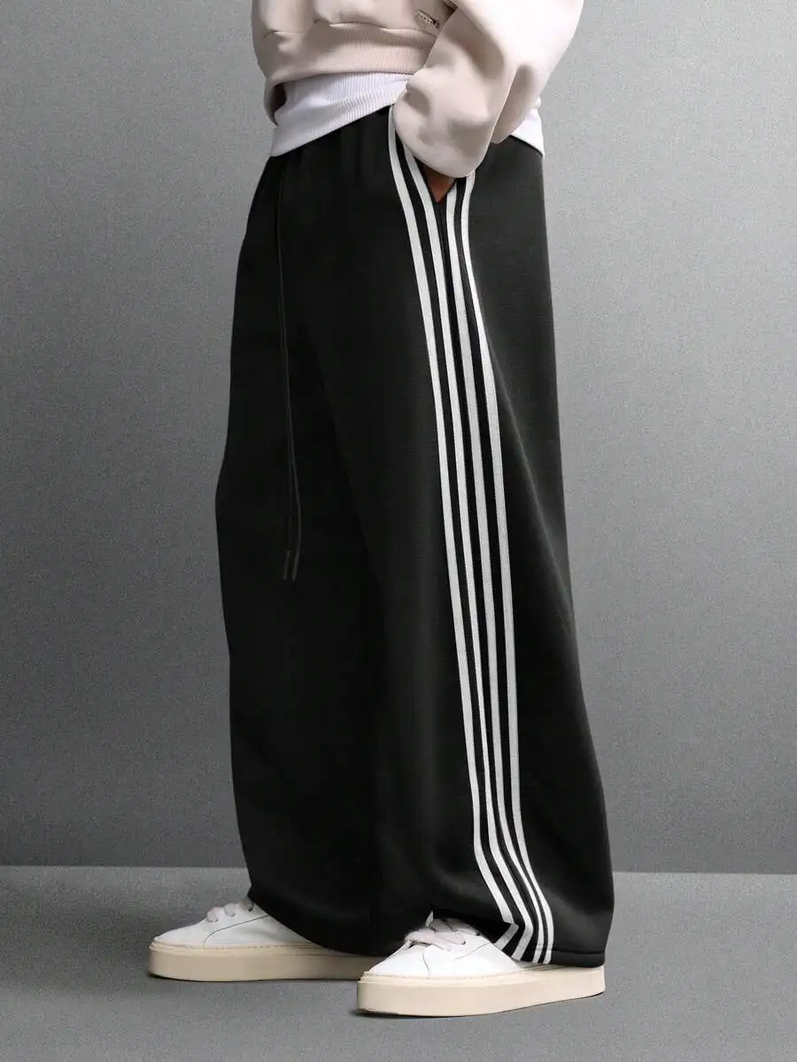 Black Wide Leg Track Pants With Triple White Side Stripes, Loose Fit Casual Sweatpants For Streetwear And Daily Wear
Black Wide Leg Track Pants With Triple White Side Stripes, Loose Fit Casual Sweatpants For Streetwear And Daily Wear