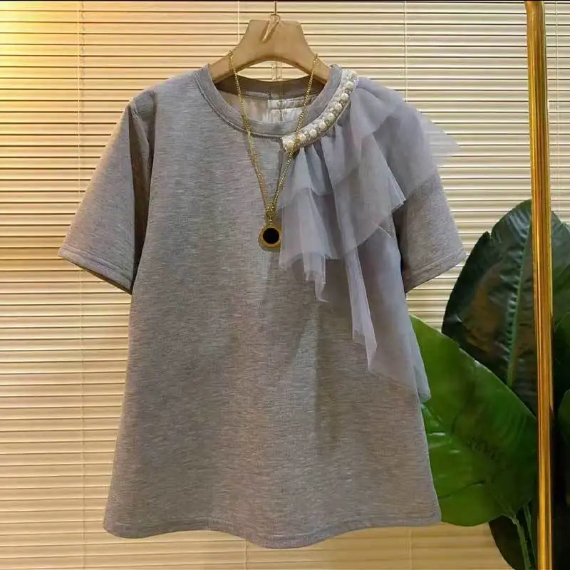 2025 summer new fashionable and versatile slightly T-shirt reducing age slimming flesh nail bead mesh trendy elegant top
2025 summer new fashionable and versatile slightly T-shirt reducing age slimming flesh nail bead mesh trendy elegant top