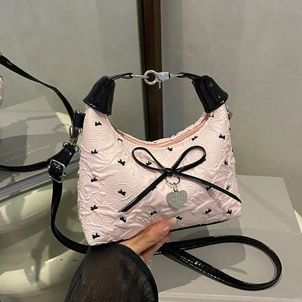 Bow Crossbody bag for women Sweet Fashion Print Metal heart Pendant Hand-held Single shoulder bag Commute Handbag Underarm pouch 
Bow Crossbody bag for women Sweet Fashion Print Metal heart Pendant Hand-held Single shoulder bag Commute Handbag Underarm pouch