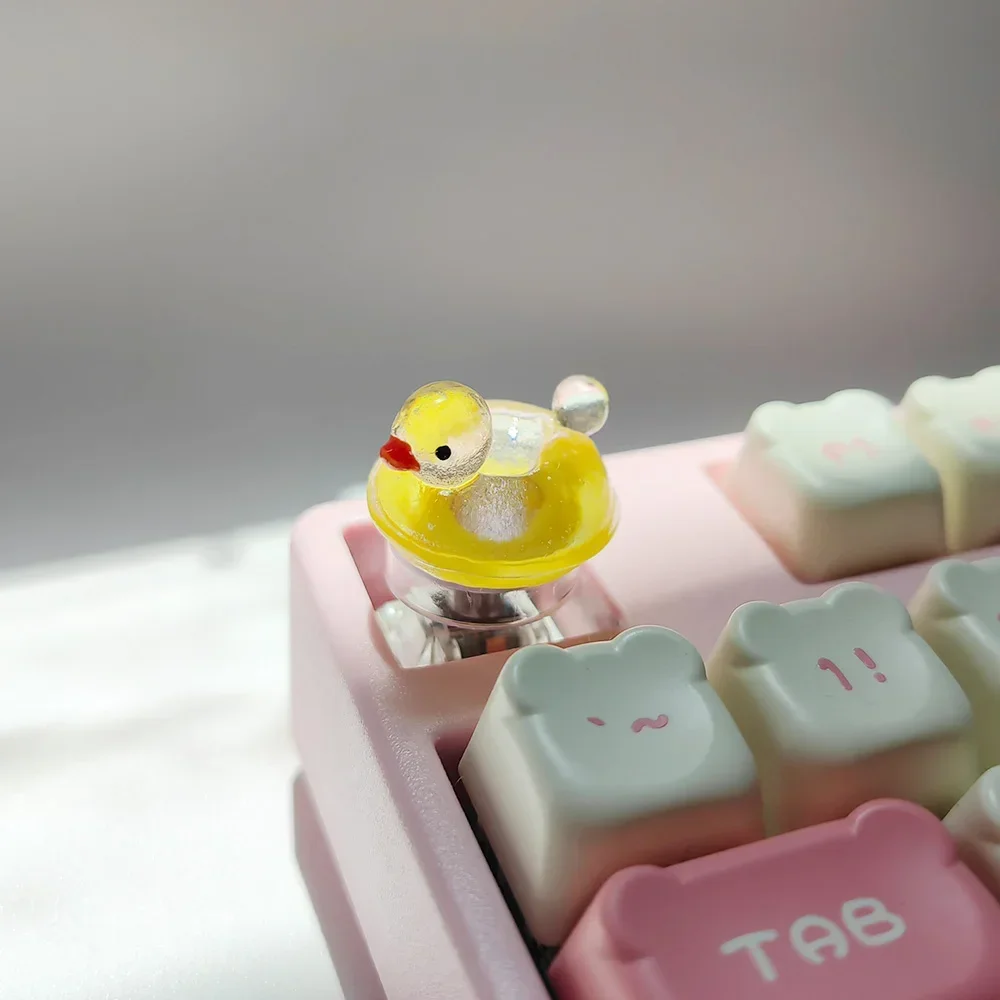 Small yellow duck keycap, transparent round mechanical keyboard ESC swimming ring duck
Small yellow duck keycap, transparent round mechanical keyboard ESC swimming ring duck