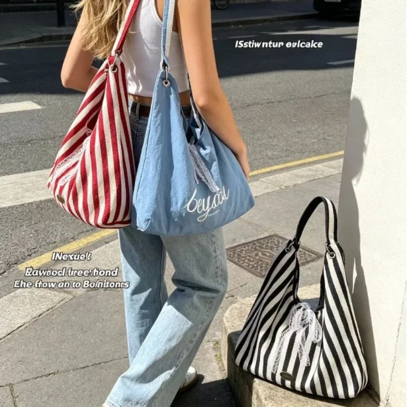 Large-Capacity Double-Sided Striped Canvas Shoulder Bag Fashionable Women's Tote for Commuting Casual Simple Lazy Style
Large-Capacity Double-Sided Striped Canvas Shoulder Bag Fashionable Women's Tote for Commuting Casual Simple Lazy Style