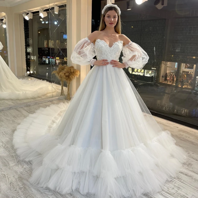 White Sweetheart Neck Long Sleeved Lace Up Ball Gown Wedding Dress 2024 Luxury Lace Tull Tiered Royal Train Vintage Bridal Gown
White Sweetheart Neck Long Sleeved Lace Up Ball Gown Wedding Dress 2024 Luxury Lace Tull Tiered Royal Train Vintage Bridal Gown