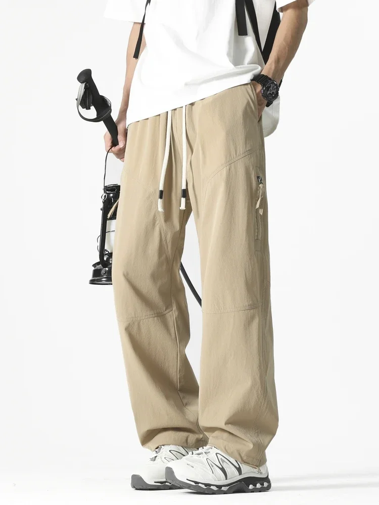 2025 Summer Men's Casual Pants Korean Fashion Outdoor Zip Pockets Wide Leg Straight Trousers Male Loose Fit Lightweight Sweatpan
2025 Summer Men's Casual Pants Korean Fashion Outdoor Zip Pockets Wide Leg Straight Trousers Male Loose Fit Lightweight Sweatpan