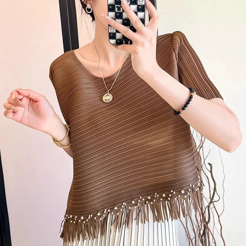 Модная плиссированная женская однотонная футболка Miyake, летний новый дизайн, топ, элитная элегантная темпераментная рубашка с кисточками и бриллиантами
Модная плиссированная женская однотонная футболка Miyake, летний новый дизайн, топ, элитная элегантная темпераментная рубашка с кисточками и бриллиантами