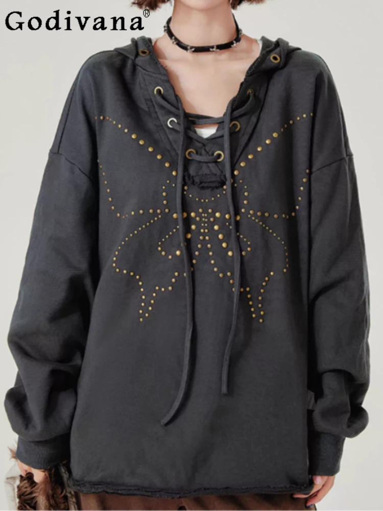 Весенне-осенний модный новый американский свитер с капюшоном в стиле ретро, с эффектом потертости, на заклепках, свободный, универсальный, с V-образным вырезом на шнуровке, с длинными рукавами
Весенне-осенний модный новый американский свитер с капюшоном в стиле ретро, с эффектом потертости, на заклепках, свободный, универсальный, с V-образным вырезом на шнуровке, с длинными рукавами