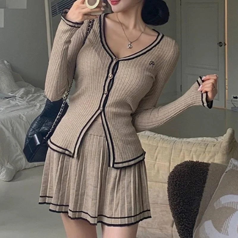 Zhibo ZB165 Highly Recommended Knitted V-neck Color Block Vertical Stripe Open Cardigan Skirt Set Fashionable Women's Ensemble
Zhibo ZB165 Highly Recommended Knitted V-neck Color Block Vertical Stripe Open Cardigan Skirt Set Fashionable Women's Ensemble