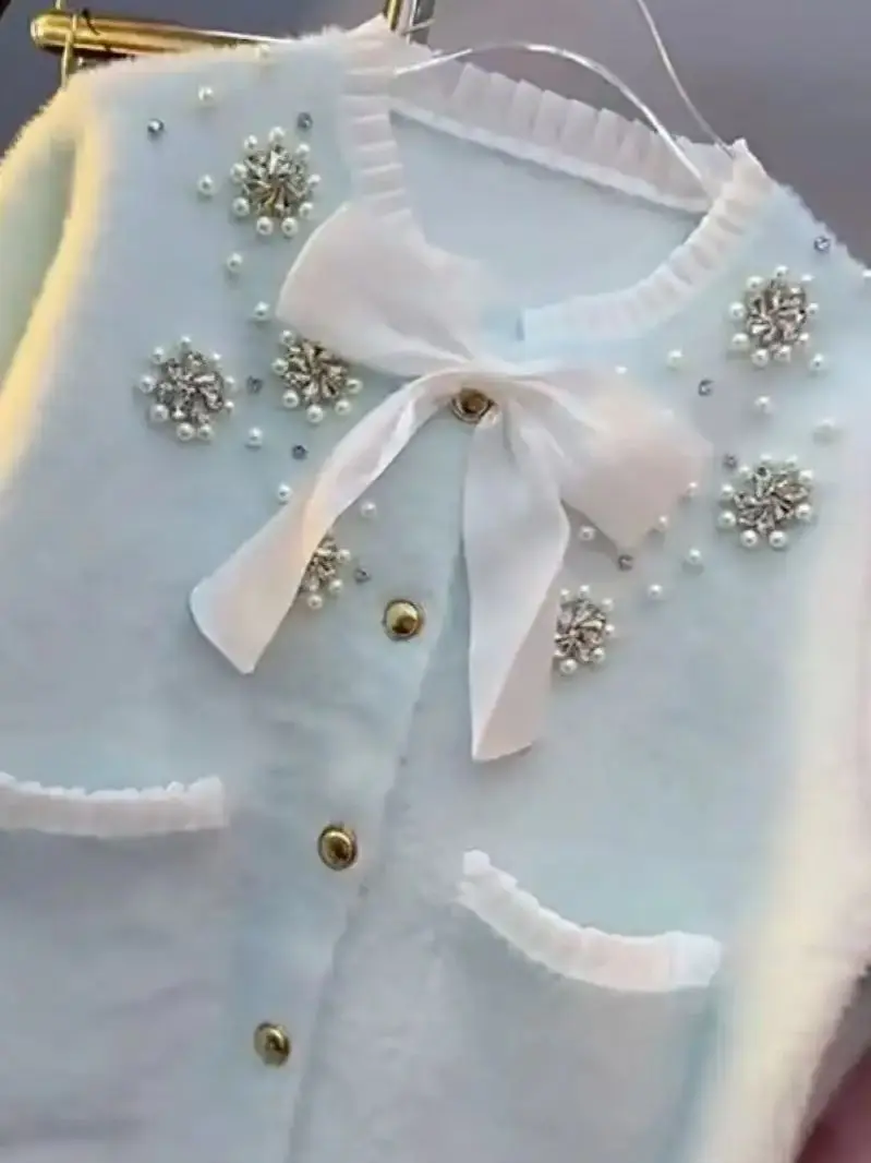 Зима 2025 г., трикотаж с жемчугом и бриллиантами, кардиган из искусственного меха, пальто для женщин, элегантный офисный женский свитер, верхняя одежда, вязаная куртка
Зима 2025 г., трикотаж с жемчугом и бриллиантами, кардиган из искусственного меха, пальто для женщин, элегантный офисный женский свитер, верхняя одежда, вязаная куртка