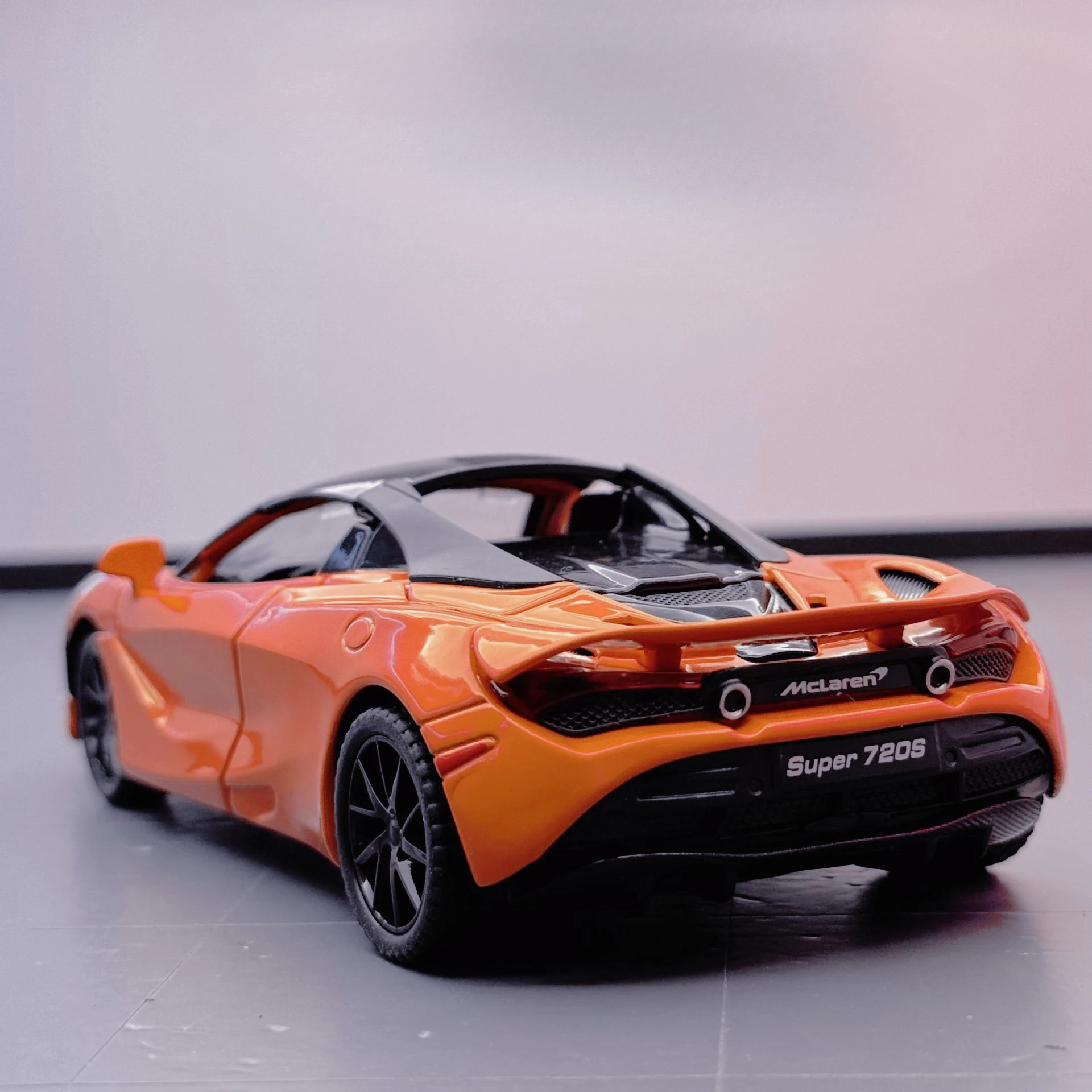 Alloy car model 1:32 720S sports car rebound children's toy sound effect model ornament
Alloy car model 1:32 720S sports car rebound children's toy sound effect model ornament