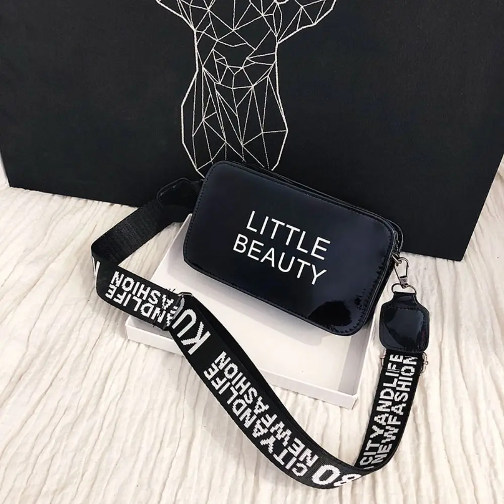 Симпатичная сумка, лазерная сумка-мессенджер, сумка для телефона из ПВХ, сумка в корейском стиле, сумка через плечо с буквенным принтом, квадратная сумка из ПВХ для хранения телефона 
Симпатичная сумка, лазерная сумка-мессенджер, сумка для телефона из ПВХ, сумка в корейском стиле, сумка через плечо с буквенным принтом, квадратная сумка из ПВХ для хранения телефона