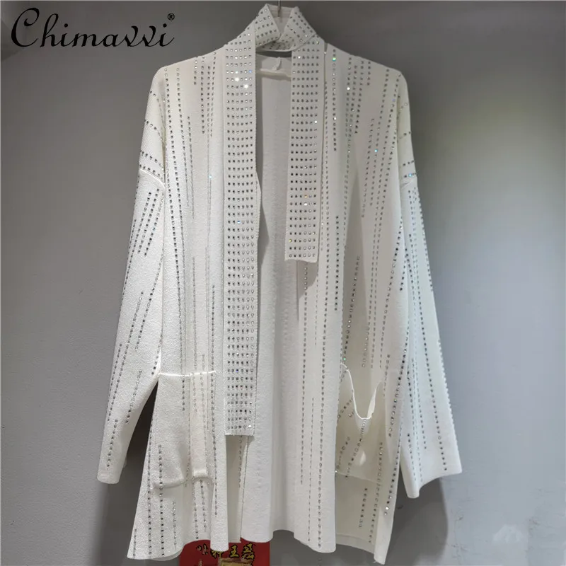 2025 Autumn New Heavy Rhinestone Vertical Stripe Design Sweater Coat Fashion Loose Slim Mid-Length Knitted Cardigan for Women
2025 Autumn New Heavy Rhinestone Vertical Stripe Design Sweater Coat Fashion Loose Slim Mid-Length Knitted Cardigan for Women