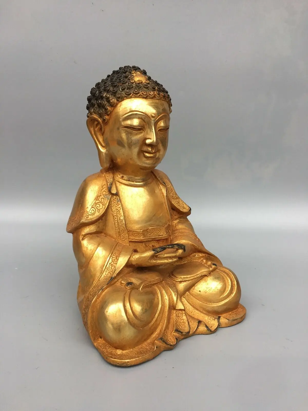 Tibet Buddhism old temple Tibet yongle mark bronze gilt Shakya Muni statue
Tibet Buddhism old temple Tibet yongle mark bronze gilt Shakya Muni statue