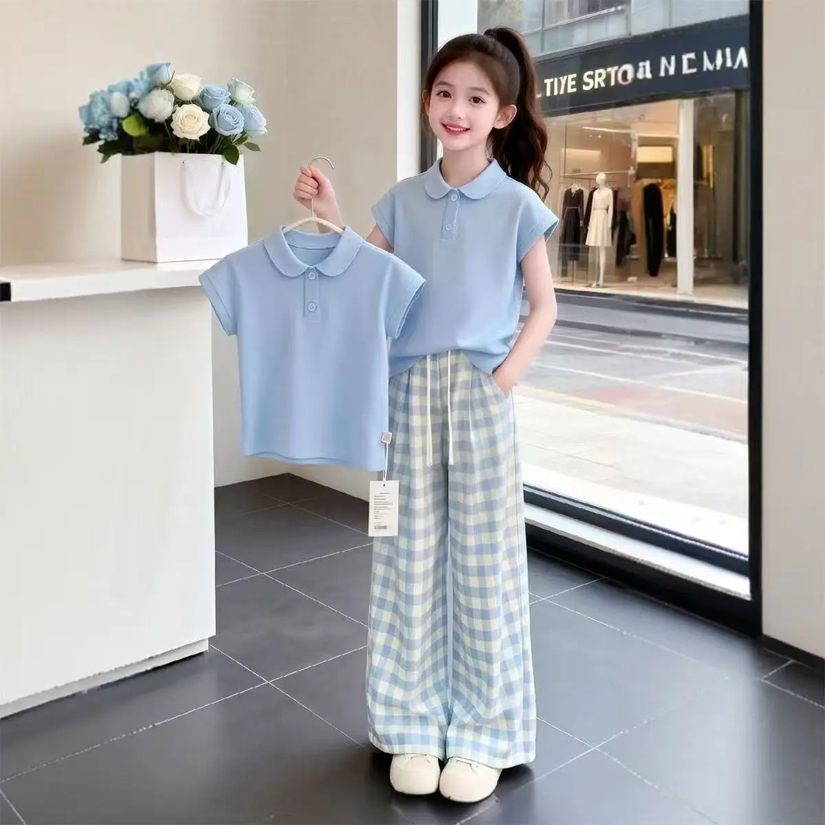 Summer Girls' Fashion Set New Style Children's Short Sleeve Polo Collar T-shirt+Plaid Pants Two Piece Set
Summer Girls' Fashion Set New Style Children's Short Sleeve Polo Collar T-shirt+Plaid Pants Two Piece Set