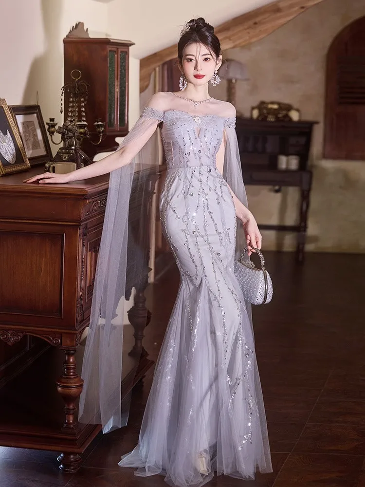 Fishtail one-shoulder high-end ethereal light luxury niche adult host toasting flash dress
Fishtail one-shoulder high-end ethereal light luxury niche adult host toasting flash dress