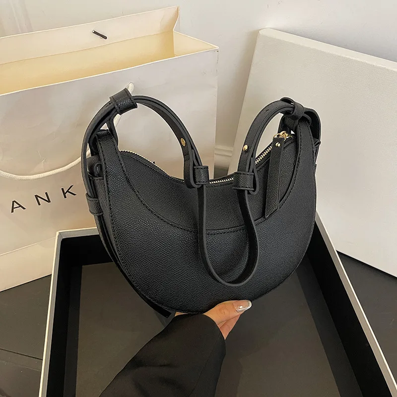 Элитная сумка-кроссбоди «Французская полумесяц» для повседневного использования, модный нишевый дизайн, кожаная сумка «полумесяц» с текстурой, стильная сумка-седло
Элитная сумка-кроссбоди «Французская полумесяц» для повседневного использования, модный нишевый дизайн, кожаная сумка «полумесяц» с текстурой, стильная сумка-седло