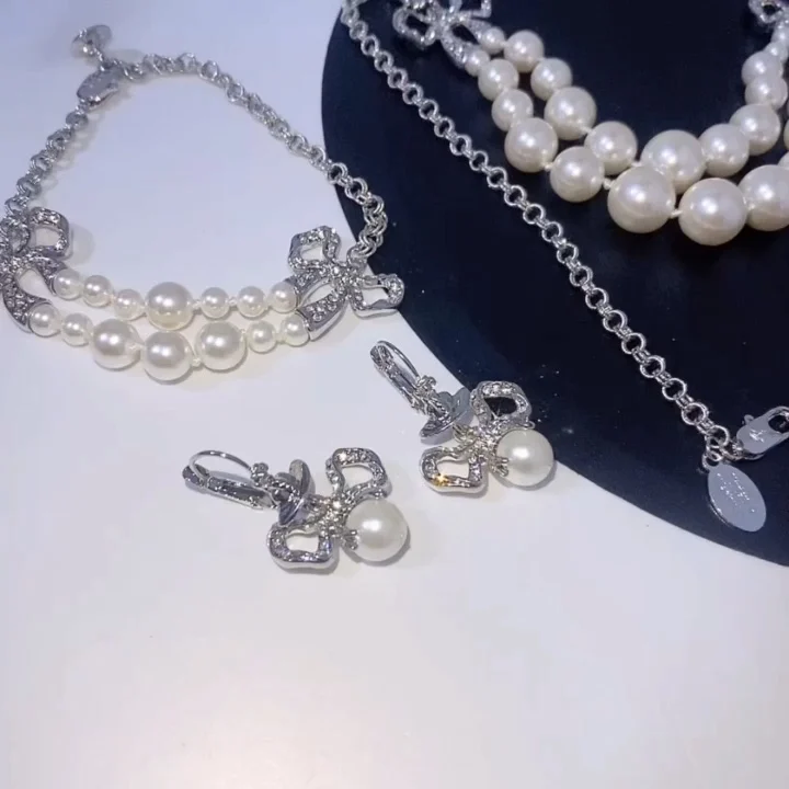 Butterfly Knot Pearl Earrings Fashion Design Simple Hepburn Style Earrings Set Necklace
Butterfly Knot Pearl Earrings Fashion Design Simple Hepburn Style Earrings Set Necklace