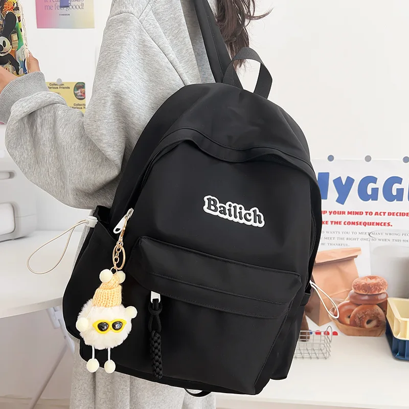 Casual Backpack For Students Waterproof Nylon School Bag With Multiple Compartments Cute Plush Charm For Daily Travel
Casual Backpack For Students Waterproof Nylon School Bag With Multiple Compartments Cute Plush Charm For Daily Travel