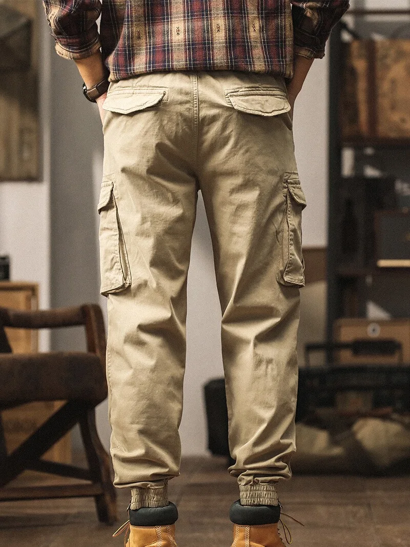 Новые мужские рабочие брюки свободного кроя большого размера, модные, брендовые, с манжетами, на резинке, из хлопка, с несколькими карманами, осенние, с регулируемым поясом на шнурке
Новые мужские рабочие брюки свободного кроя большого размера, модные, брендовые, с манжетами, на резинке, из хлопка, с несколькими карманами, осенние, с регулируемым поясом на шнурке