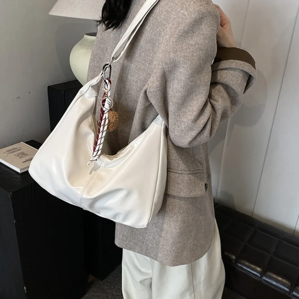 Casual With Pendant PU Leather Shoulder Bag Zipper Solid Color Hobo Bag Crossbody Bag Korean Style Women's Handbag Lady
Casual With Pendant PU Leather Shoulder Bag Zipper Solid Color Hobo Bag Crossbody Bag Korean Style Women's Handbag Lady