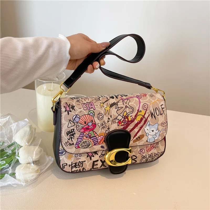 2025 Trendy Graffiti Messenger Bag Women's Printed Crossbody Shoulder Purse Fashion Casual Handbag 
2025 Trendy Graffiti Messenger Bag Women's Printed Crossbody Shoulder Purse Fashion Casual Handbag