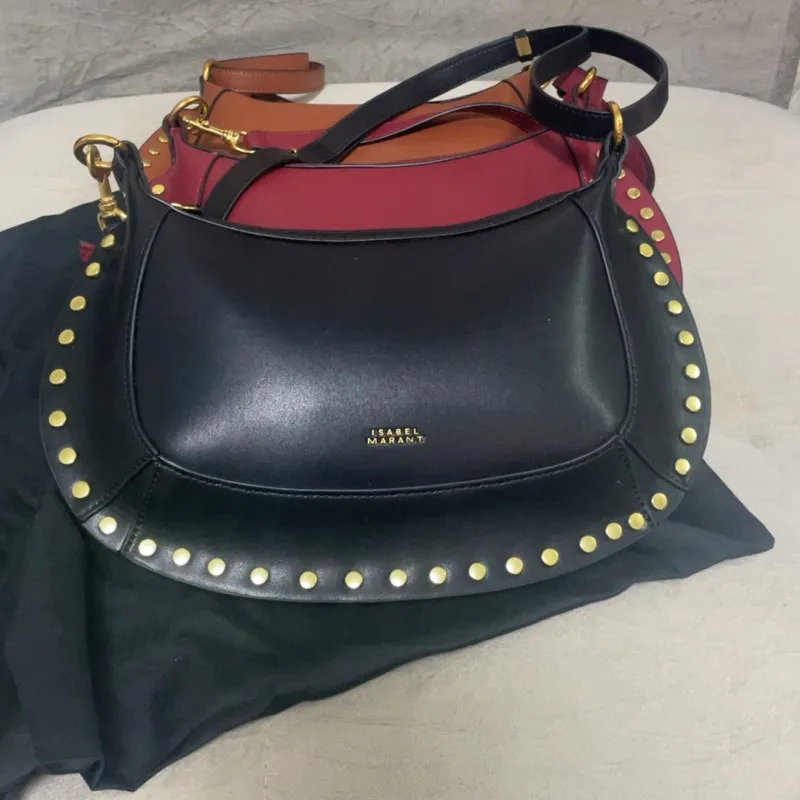 Nouveau sac lune tendance, rivets classiques, mode féminine, rétro, sac à bandoulière, sac à main, sac porté croisé
Nouveau sac lune tendance, rivets classiques, mode féminine, rétro, sac à bandoulière, sac à main, sac porté croisé