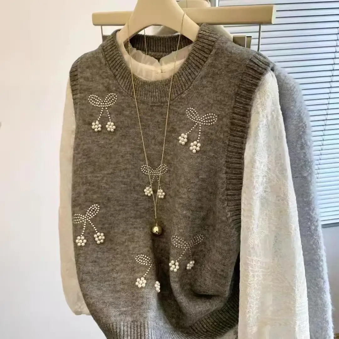 Korean Vintage Sweater O-Neck Nail Bead Knitted Vest Spring Autumn New Embroidery Flower Casual Vest Sleeveless Sweater Top
Korean Vintage Sweater O-Neck Nail Bead Knitted Vest Spring Autumn New Embroidery Flower Casual Vest Sleeveless Sweater Top