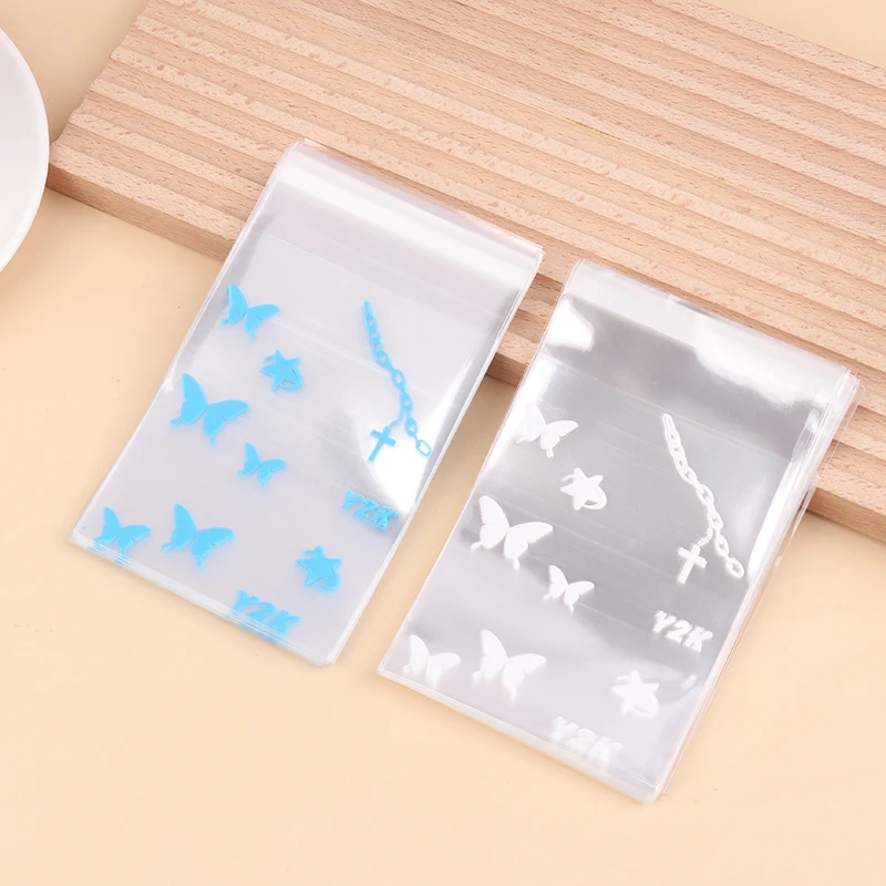 50Pcs Cute Transparent Self Adhesive Bag Hand Account Small Card Packaging Bag Jewelry Bracelet Small Item Gift Bag
50Pcs Cute Transparent Self Adhesive Bag Hand Account Small Card Packaging Bag Jewelry Bracelet Small Item Gift Bag