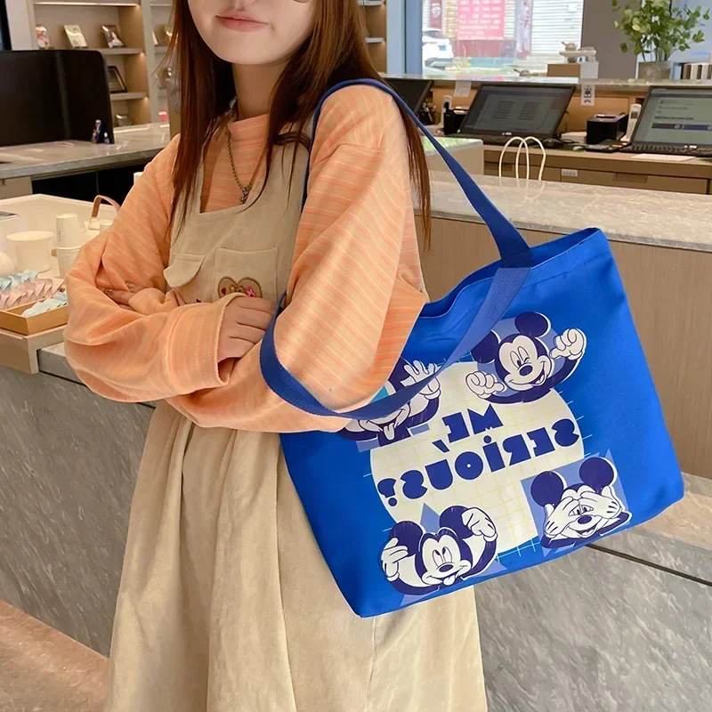 Disney Mickey Mouse Large Capacity Shoulder Bag New Canvas Women's Handbag Cartoon storage Tote Bag
Disney Mickey Mouse Large Capacity Shoulder Bag New Canvas Women's Handbag Cartoon storage Tote Bag
