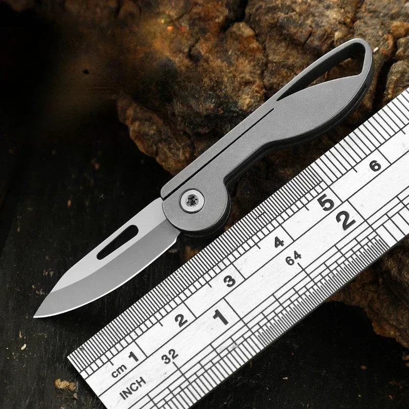 Portable Pocket Knife with Stainless Steel Blade, Titanium Alloy Handle, Keychain Pendant, Travel Camping Unboxing Tool
Portable Pocket Knife with Stainless Steel Blade, Titanium Alloy Handle, Keychain Pendant, Travel Camping Unboxing Tool