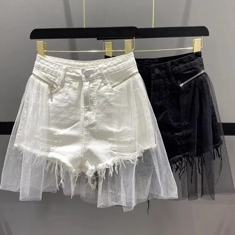 Летние кружевные джинсовые шорты из двух предметов для женщин с высокой талией и рваными отверстиями, широкие брюки с волосатыми краями, модные
Летние кружевные джинсовые шорты из двух предметов для женщин с высокой талией и рваными отверстиями, широкие брюки с волосатыми краями, модные