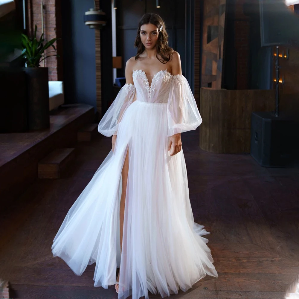 Modern Long Puff Sleeves Beaded Applique Tulle Organza Boho Beach A Line Wedding Dresses Side Slit Custom Made Princess Women
Modern Long Puff Sleeves Beaded Applique Tulle Organza Boho Beach A Line Wedding Dresses Side Slit Custom Made Princess Women