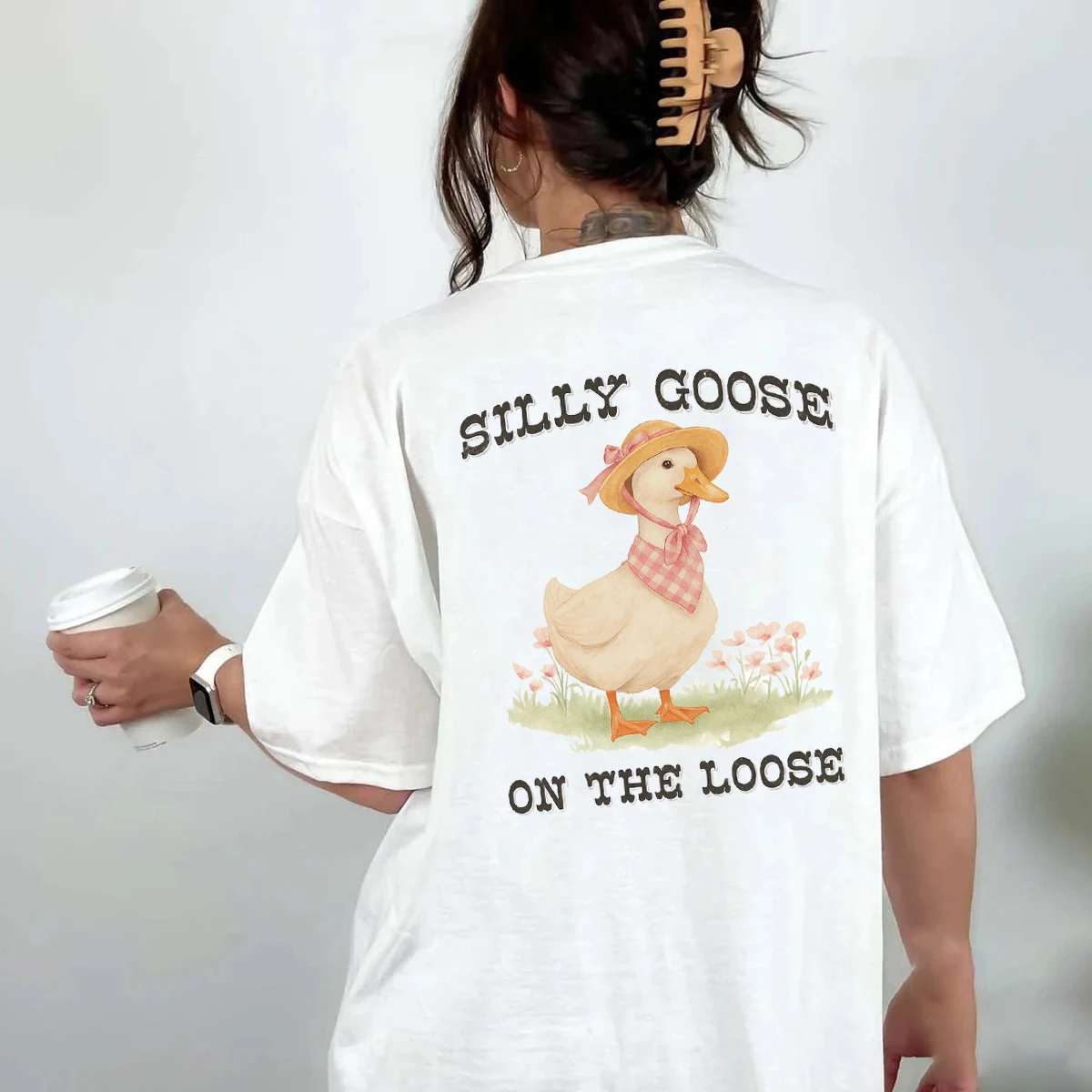 Женские топы больших размеров в стиле ретро с рисунком Silly Goose, милые забавные футболки с мемами, винтажная футболка в стиле хиппи в стиле бохо с коротким рукавом
Женские топы больших размеров в стиле ретро с рисунком Silly Goose, милые забавные футболки с мемами, винтажная футболка в стиле хиппи в стиле бохо с коротким рукавом