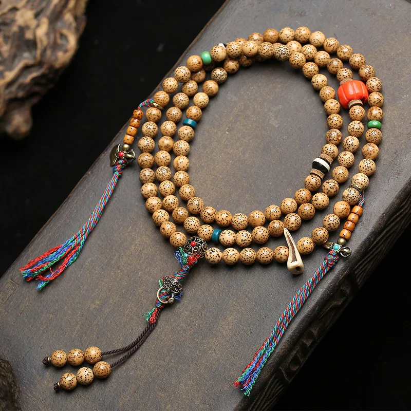 Tibetan-style antique star-and-moon bodhi beads with natural cracks, 108-bead rosary, round beads, coral and yak bone
Tibetan-style antique star-and-moon bodhi beads with natural cracks, 108-bead rosary, round beads, coral and yak bone