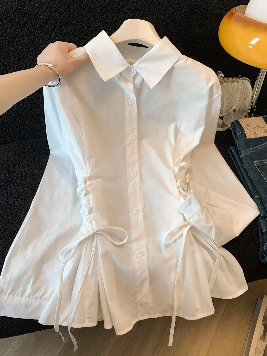 Retro Korean White Shirt Women's Spring 2026 New Long Sleeve Belted Design Slimming Top French Style Waist-Cinching Fashion
Retro Korean White Shirt Women's Spring 2026 New Long Sleeve Belted Design Slimming Top French Style Waist-Cinching Fashion