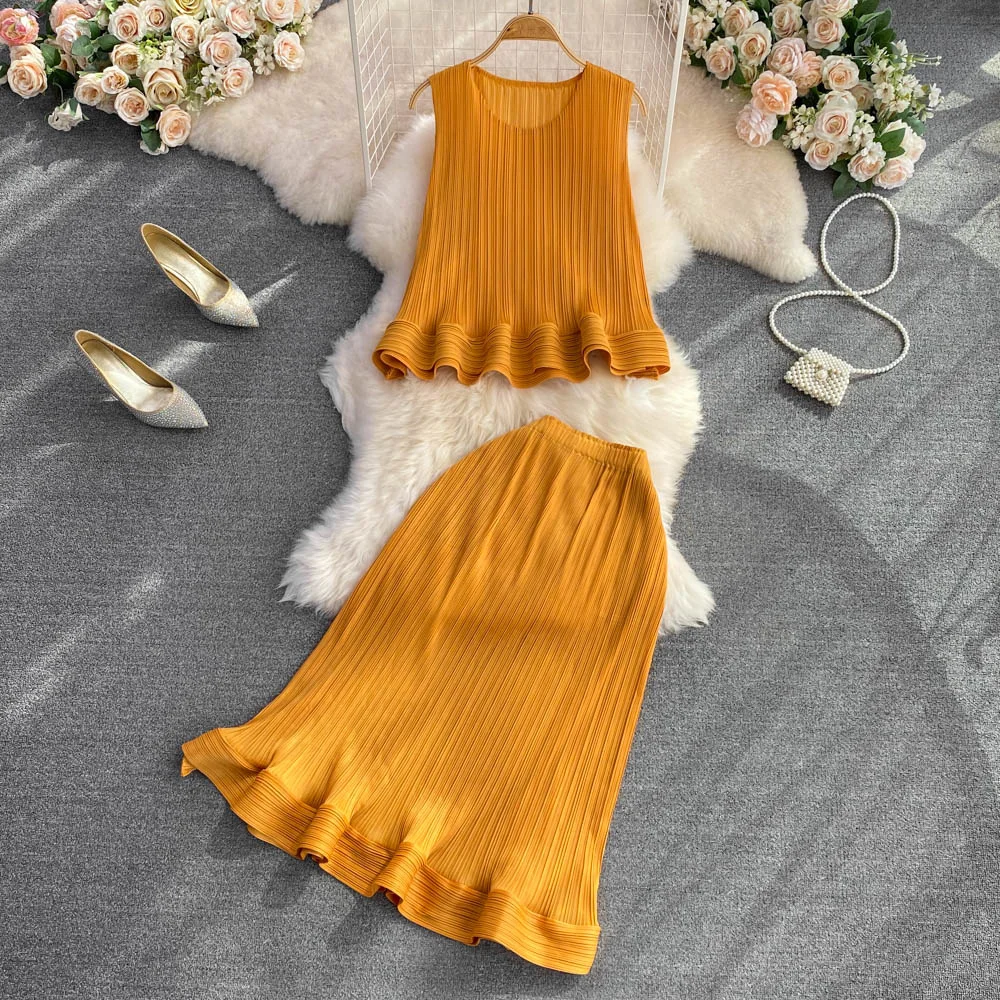 Fashion Skirt Suit Women Light Mature Style Round Neck Loose Sleeveless Ruffle Top Two-piece High Waist Slim Long Pleated Skirt
Fashion Skirt Suit Women Light Mature Style Round Neck Loose Sleeveless Ruffle Top Two-piece High Waist Slim Long Pleated Skirt