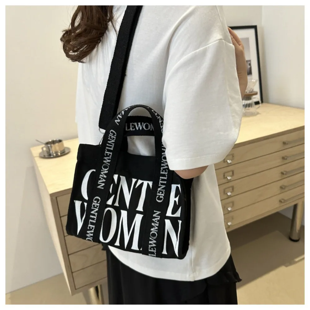 New canvas shoulder bag collision color letters printing color shoulder strap leisure handbag crossbody bag
New canvas shoulder bag collision color letters printing color shoulder strap leisure handbag crossbody bag