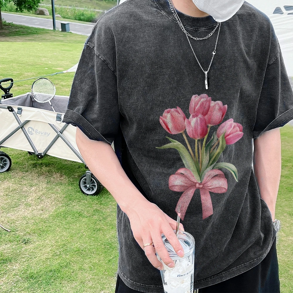 Y2K Graphic T-shirt, Pink Tulips with Bow Print, Delicate, Romantic and Floral, Soft Fabric for Spring-Inspired Casual Looks
Y2K Graphic T-shirt, Pink Tulips with Bow Print, Delicate, Romantic and Floral, Soft Fabric for Spring-Inspired Casual Looks