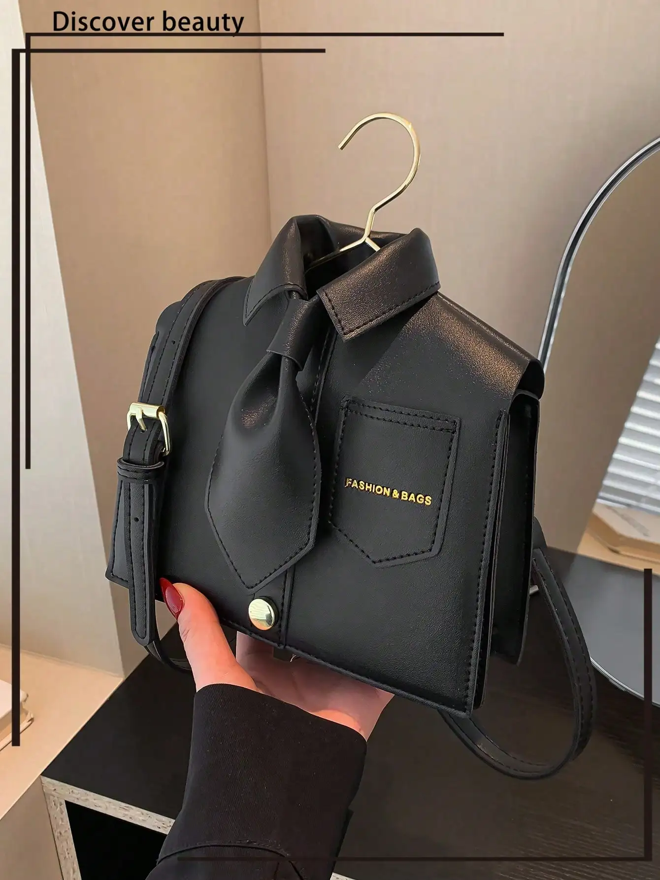 Black Collar-Style Crossbody Bag with Tie Detail and Flip Cover
Black Collar-Style Crossbody Bag with Tie Detail and Flip Cover