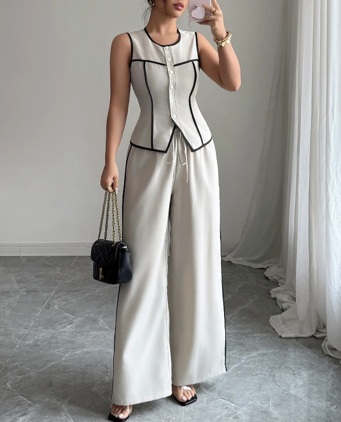 Casual and Elegant Button Top and High Waisted Wide Leg Pants Set, Summer Fashion Color Blocking Design, Slim Fit 2-Piece Set
Casual and Elegant Button Top and High Waisted Wide Leg Pants Set, Summer Fashion Color Blocking Design, Slim Fit 2-Piece Set