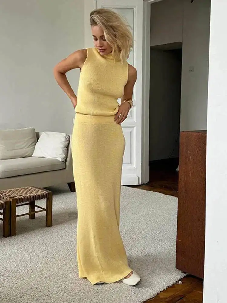 Элегантный длинный женский вязаный жилет без рукавов из двух предметов с воротником, тонкий новый модный комплект с юбкой 
Элегантный длинный женский вязаный жилет без рукавов из двух предметов с воротником, тонкий новый модный комплект с юбкой