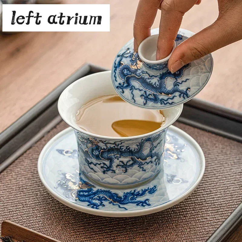150ml Antique Gold Silver Inlaid Blue and White Dragon Gaiwan Household Tea Maker Cover Bowl Tea Services Decoration
150ml Antique Gold Silver Inlaid Blue and White Dragon Gaiwan Household Tea Maker Cover Bowl Tea Services Decoration
